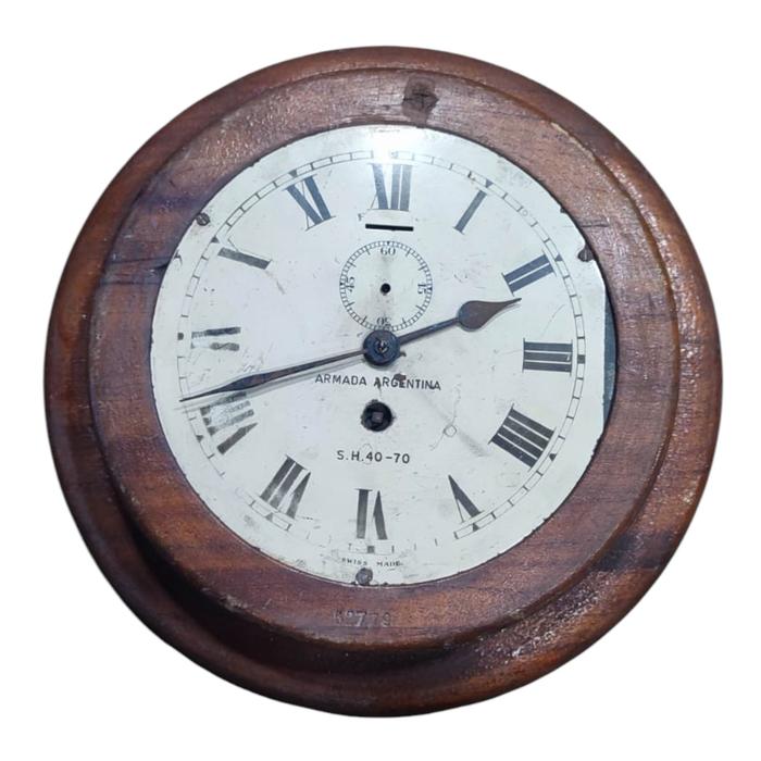 RELOJ DE MANPARO CON MARCO EN MADERA - REZAGO NAVAL -.